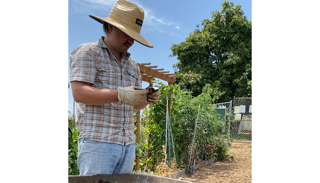 Oren Skoog - Working in his Community Garden